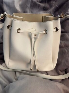 kate spade Cream Leather Drawstring Crossbody Bag